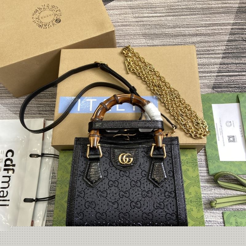 G*u*i top handle bags